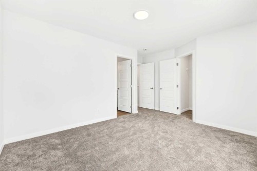 301-40 Creekside Way Sw, Calgary, AB - Indoor Photo Showing Other Room