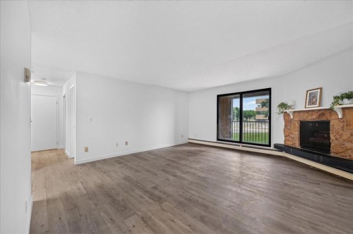 3106-4001C 49 Street Nw, Calgary, AB - Indoor With Fireplace