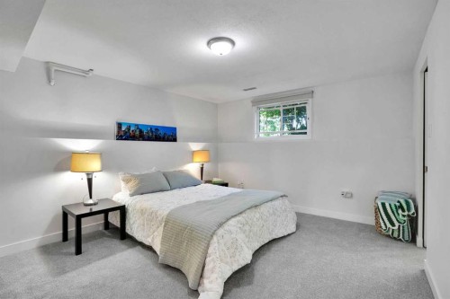 9667 Oakhill Drive Sw, Calgary, AB - Indoor Photo Showing Bedroom