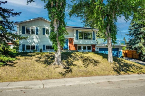 9667 Oakhill Drive Sw, Calgary, AB - Outdoor With Facade