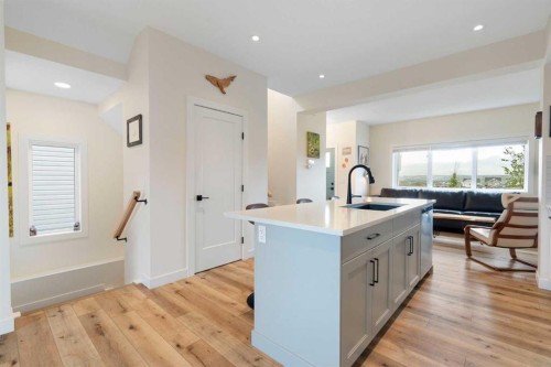 49 River Heights Drive, Cochrane, AB - Indoor Photo Showing Kitchen