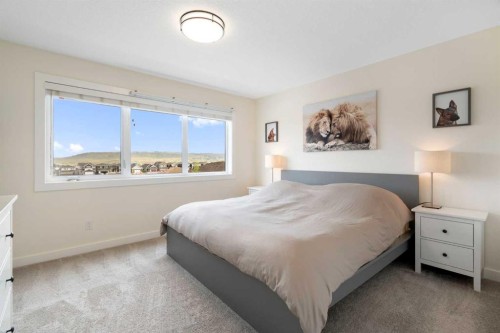49 River Heights Drive, Cochrane, AB - Indoor Photo Showing Bedroom