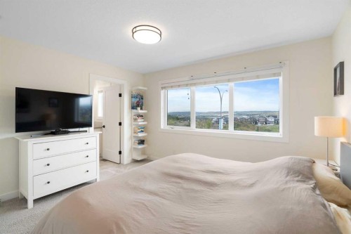 49 River Heights Drive, Cochrane, AB - Indoor Photo Showing Bedroom