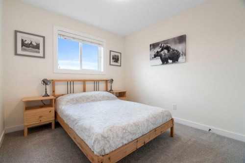 49 River Heights Drive, Cochrane, AB - Indoor Photo Showing Bedroom