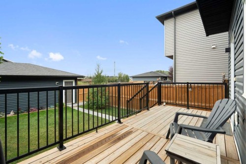 49 River Heights Drive, Cochrane, AB - Outdoor With Deck Patio Veranda With Exterior