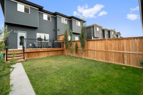 49 River Heights Drive, Cochrane, AB - Outdoor With Deck Patio Veranda