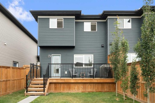49 River Heights Drive, Cochrane, AB - Outdoor With Deck Patio Veranda