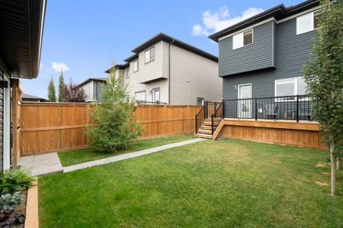 49 River Heights Drive, Cochrane, AB - Outdoor With Deck Patio Veranda With Exterior