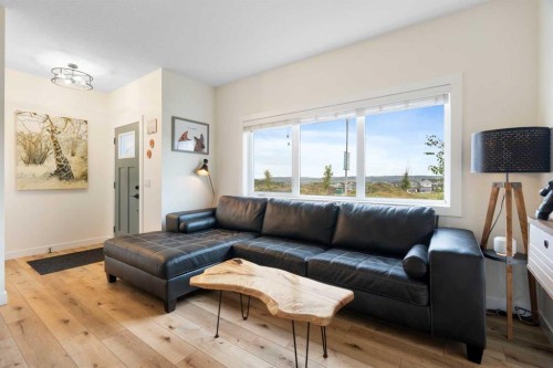 49 River Heights Drive, Cochrane, AB - Indoor Photo Showing Living Room