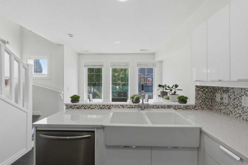 12 Chaparral Ridge Park Se, Calgary, AB - Indoor Photo Showing Kitchen With Double Sink