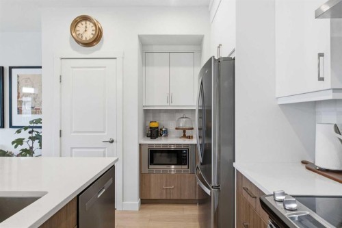 31 Seton Row Se, Calgary, AB - Indoor Photo Showing Kitchen With Stainless Steel Kitchen