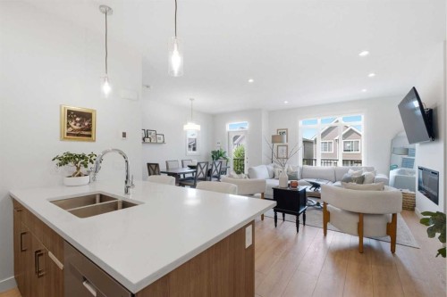31 Seton Row Se, Calgary, AB - Indoor Photo Showing Kitchen With Double Sink
