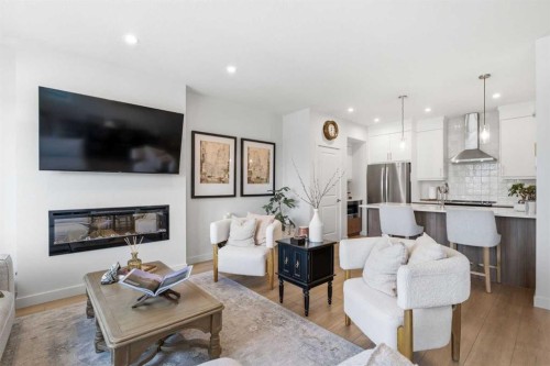 31 Seton Row Se, Calgary, AB - Indoor Photo Showing Living Room With Fireplace
