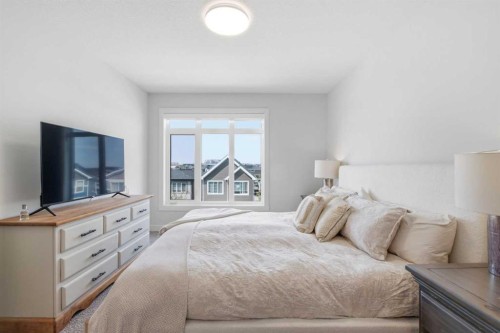 31 Seton Row Se, Calgary, AB - Indoor Photo Showing Bedroom