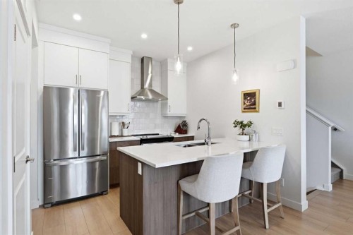 31 Seton Row Se, Calgary, AB - Indoor Photo Showing Kitchen With Stainless Steel Kitchen With Upgraded Kitchen