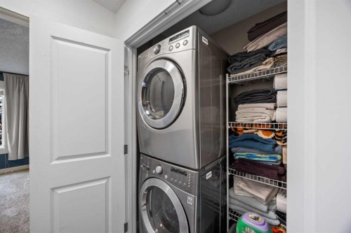 1-4711 17 Avenue Nw, Calgary, AB - Indoor Photo Showing Laundry Room