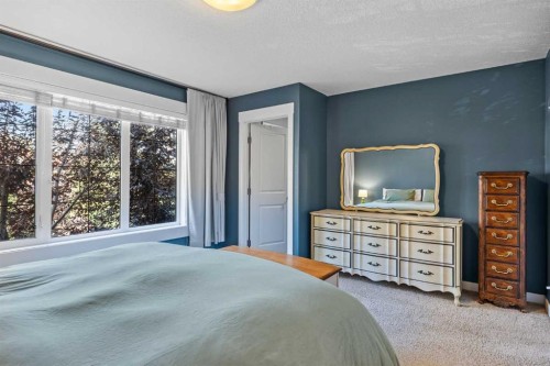 1-4711 17 Avenue Nw, Calgary, AB - Indoor Photo Showing Bedroom