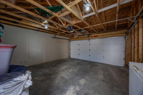 1-4711 17 Avenue Nw, Calgary, AB - Indoor Photo Showing Garage
