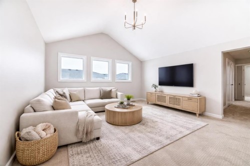 2084 Lancaster Heights Se, Airdrie, AB - Indoor Photo Showing Living Room