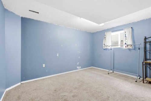 28 Coral Springs Close Ne, Calgary, AB - Indoor Photo Showing Other Room