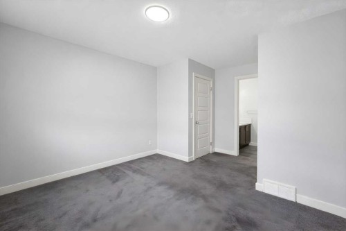 137 Pantego Lane Nw, Calgary, AB - Indoor Photo Showing Other Room