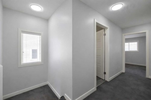 137 Pantego Lane Nw, Calgary, AB - Indoor Photo Showing Other Room