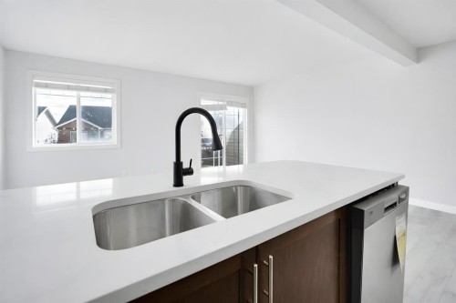 137 Pantego Lane Nw, Calgary, AB - Indoor Photo Showing Kitchen With Double Sink