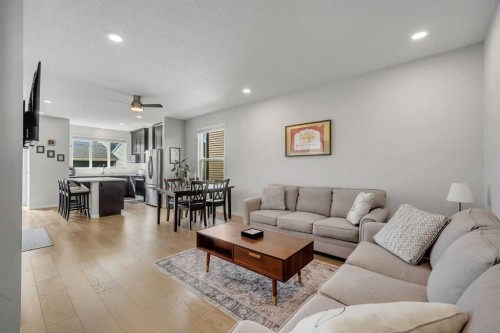 143 Dawson Harbour Hill, Chestermere, AB - Indoor Photo Showing Living Room