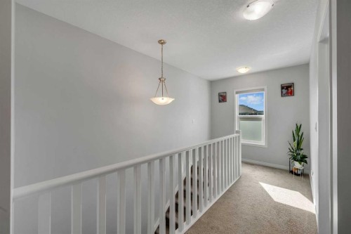 143 Dawson Harbour Hill, Chestermere, AB - Indoor Photo Showing Other Room