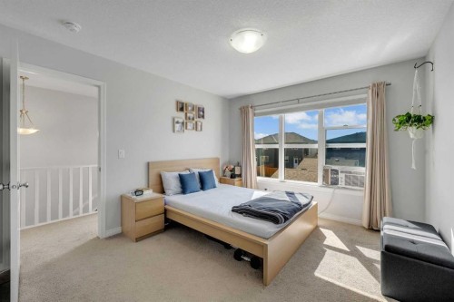 143 Dawson Harbour Hill, Chestermere, AB - Indoor Photo Showing Bedroom