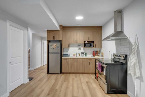 143 Dawson Harbour Hill, Chestermere, AB - Indoor Photo Showing Kitchen