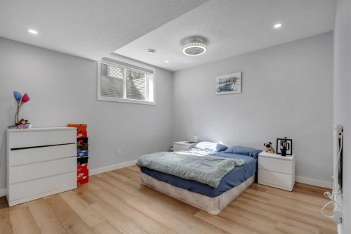 143 Dawson Harbour Hill, Chestermere, AB - Indoor Photo Showing Bedroom