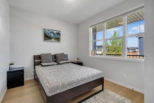 143 Dawson Harbour Hill, Chestermere, AB - Indoor Photo Showing Bedroom