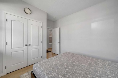 143 Dawson Harbour Hill, Chestermere, AB - Indoor Photo Showing Bedroom