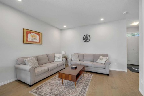 143 Dawson Harbour Hill, Chestermere, AB - Indoor Photo Showing Living Room
