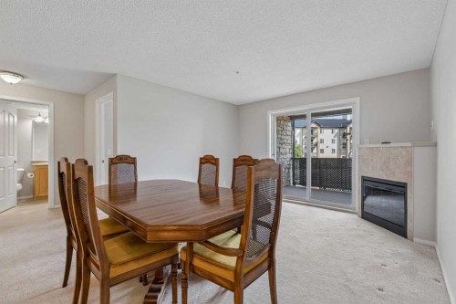 7207-304 Mackenzie Way Sw, Airdrie, AB - Indoor Photo Showing Dining Room