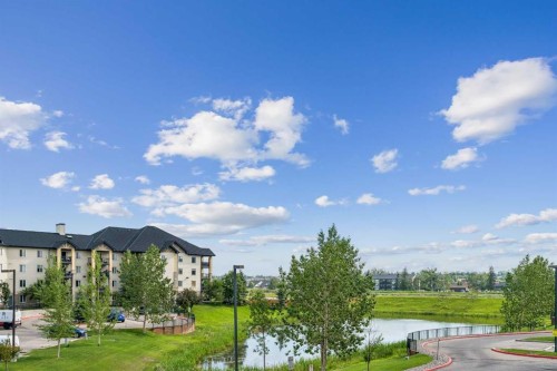 7207-304 Mackenzie Way Sw, Airdrie, AB - Outdoor With View