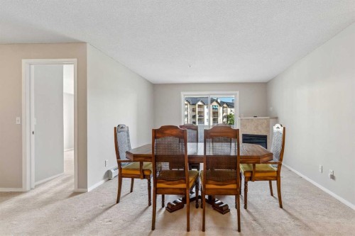 7207-304 Mackenzie Way Sw, Airdrie, AB - Indoor Photo Showing Dining Room
