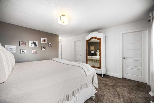 238 Mountainview Drive, Okotoks, AB - Indoor Photo Showing Bedroom