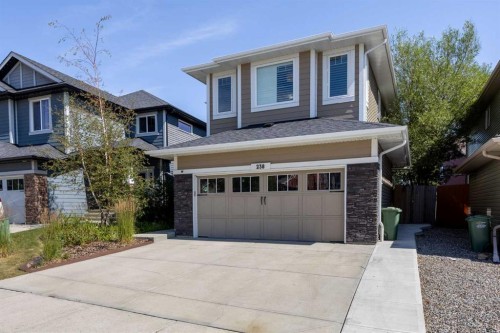 238 Mountainview Drive, Okotoks, AB - Outdoor With Facade