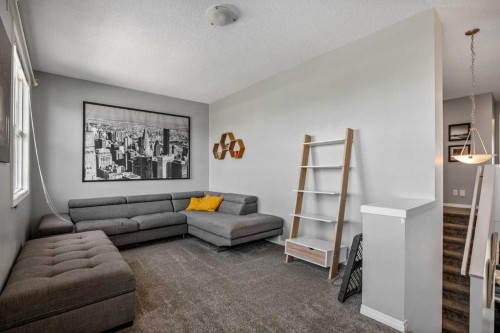 5 Copperpond Link Se, Calgary, AB - Indoor Photo Showing Living Room