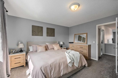 5 Copperpond Link Se, Calgary, AB - Indoor Photo Showing Bedroom