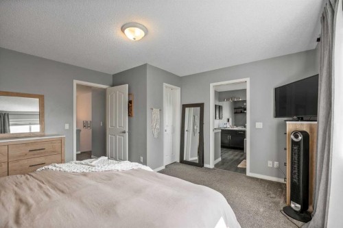 5 Copperpond Link Se, Calgary, AB - Indoor Photo Showing Bedroom