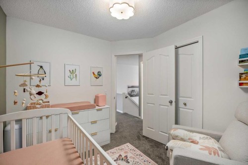 5 Copperpond Link Se, Calgary, AB - Indoor Photo Showing Bedroom