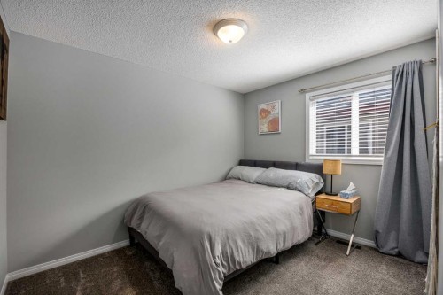 5 Copperpond Link Se, Calgary, AB - Indoor Photo Showing Bedroom