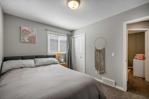 5 Copperpond Link Se, Calgary, AB - Indoor Photo Showing Bedroom