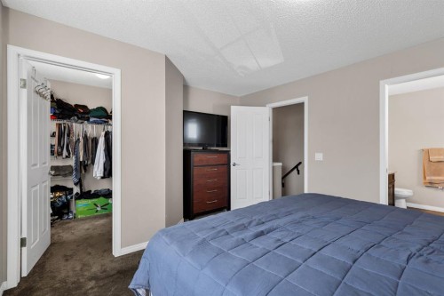 54 Autumn View Se, Calgary, AB - Indoor Photo Showing Bedroom