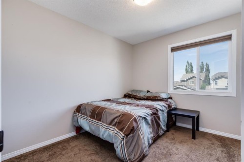54 Autumn View Se, Calgary, AB - Indoor Photo Showing Bedroom