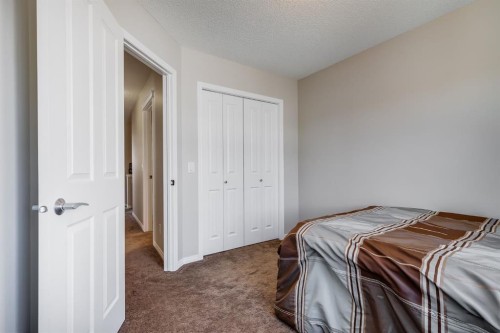 54 Autumn View Se, Calgary, AB - Indoor Photo Showing Bedroom