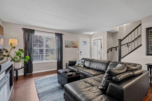 54 Autumn View Se, Calgary, AB - Indoor Photo Showing Living Room